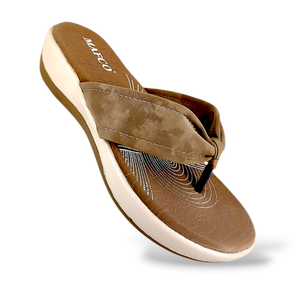 Comfortable women's wedge slippers wholesale featuring a textured cushioned sole and a wide padded strap.