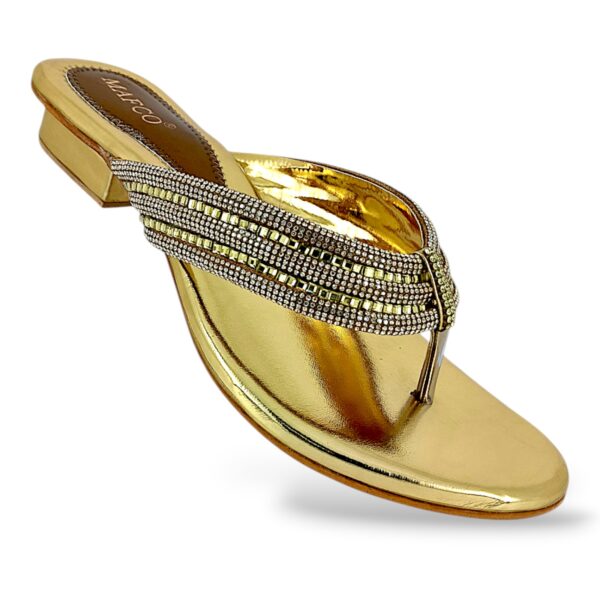 Women's flat sandals wholesale featuring a metallic finish sole and a rhinestone embellished strap.